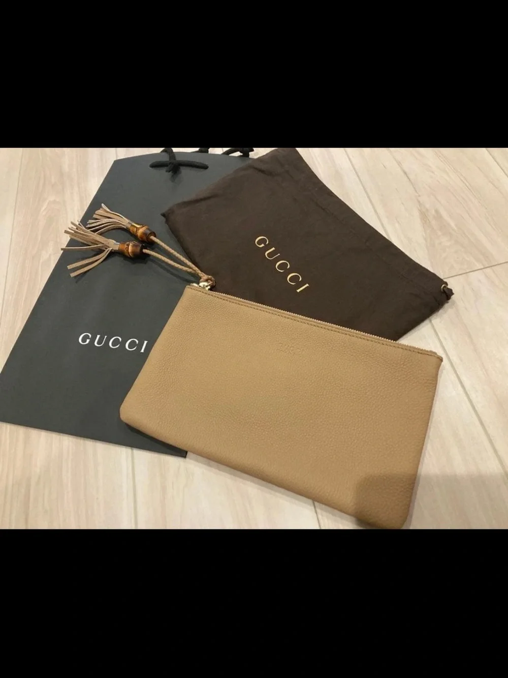 Gucci Tan Pebbled Leather Tassel Wristlet Pouch